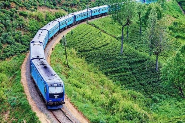 Train travelling through Sri Lanka's green hill country